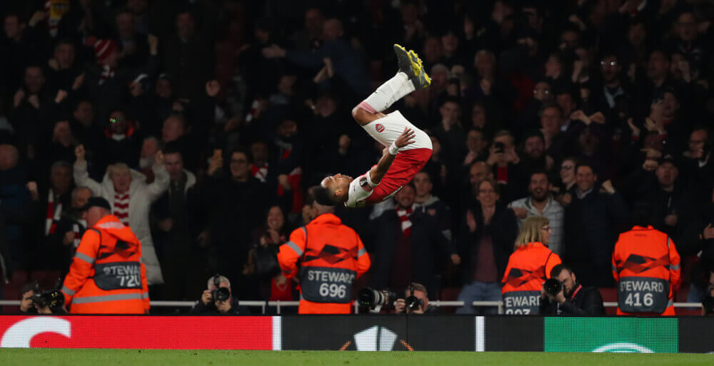 Apuestas Arsenal LONDON, ENGLAND - MAY 02 2019 Pierre-Emerick Aubameyang of Arsenal celebrates scoring a goal during the Europa League semi final leg one match between Arsenal and Valencia.